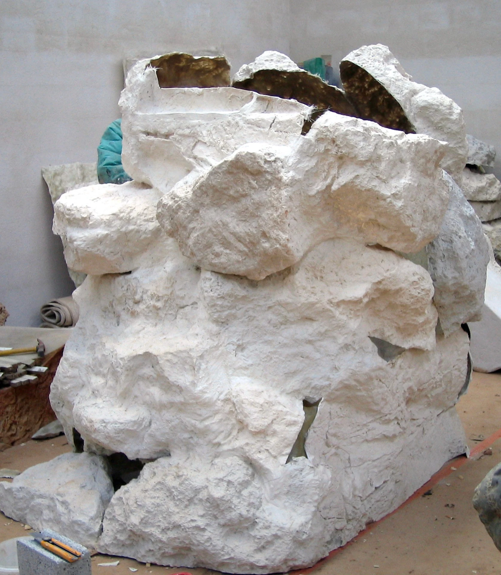 Workshop assembly of several polyester rock modules before finishing