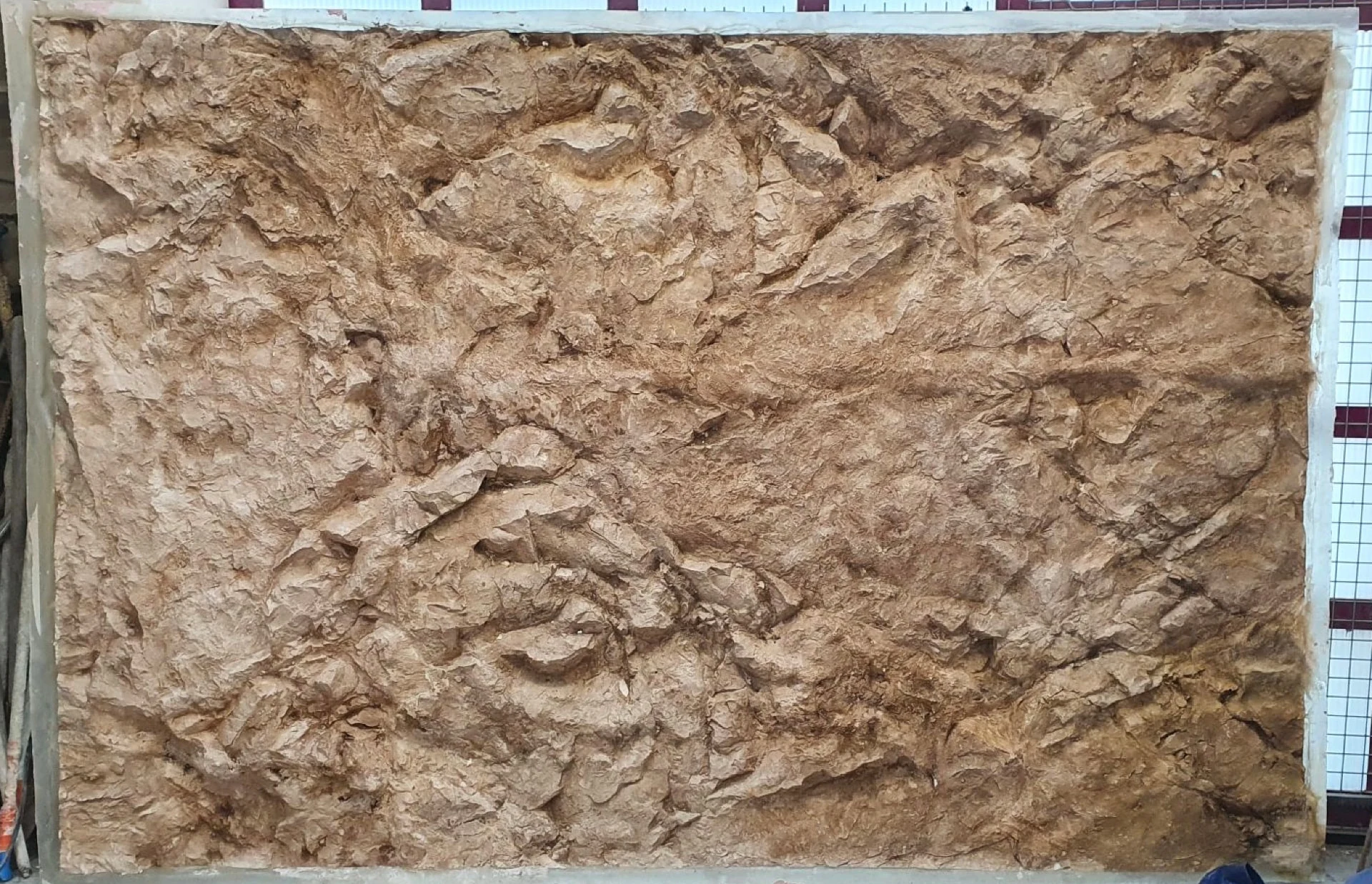 Natural-rock-look wall cladding panel with ochre patina, horizontal overall view