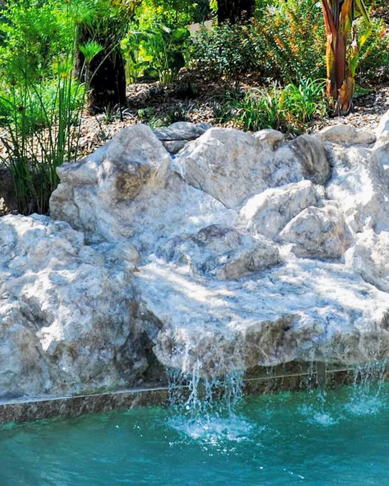 Waterfalls & Fountains – Artificial waterfalls, polyester pool cascades, lifelike water-feature rockwork