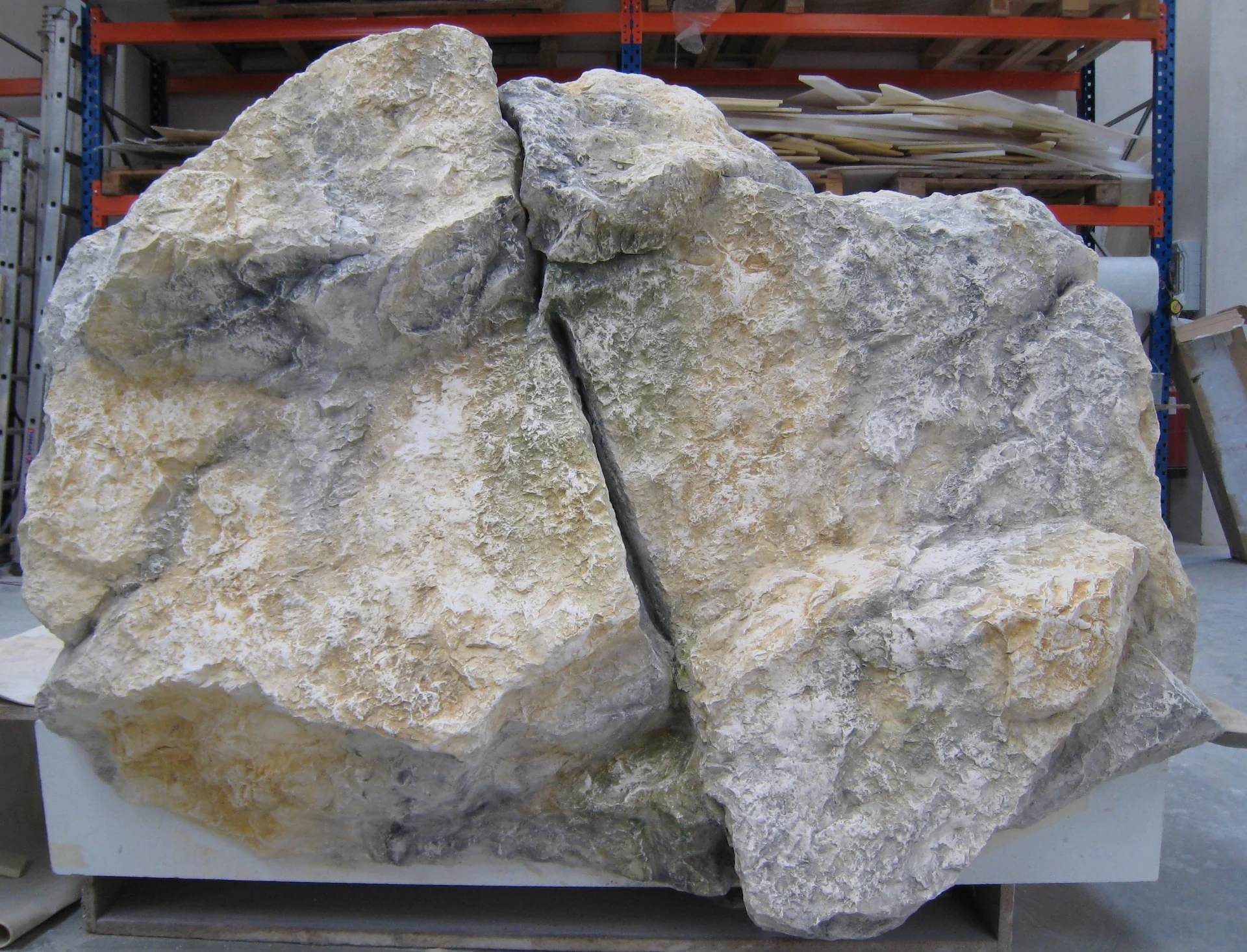 Another view of the bespoke rock block patinated in the workshop, assembly of several rock modules
